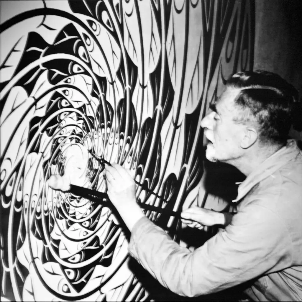 The_Artist_-_Maurits_Cornelis_Escher_-_working_at_his_Atelier