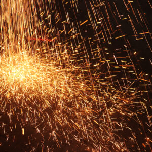 Glowing sparks abstract background texture.