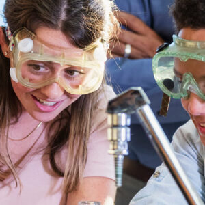 Students doing chemistry experiment in class