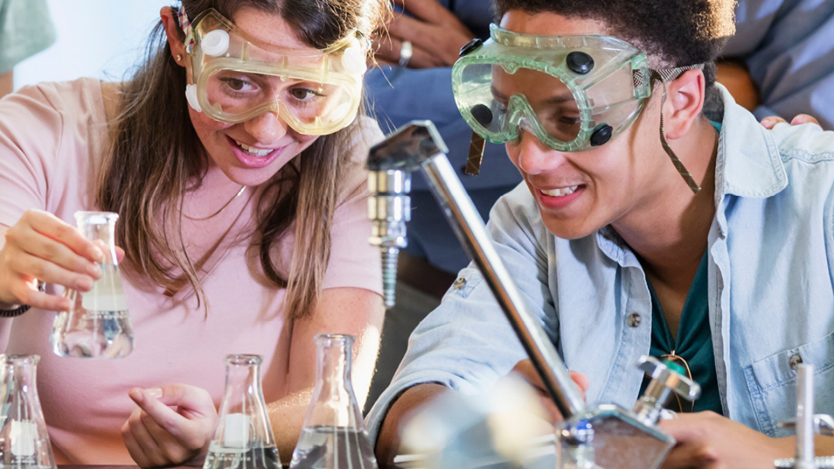 Students doing chemistry experiment in class