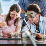 Students doing chemistry experiment in class