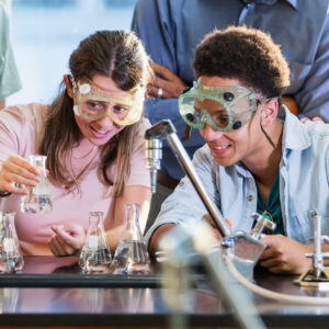 Students doing chemistry experiment in class